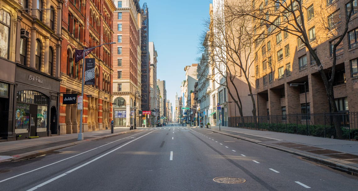 Empty city street with historic buildings